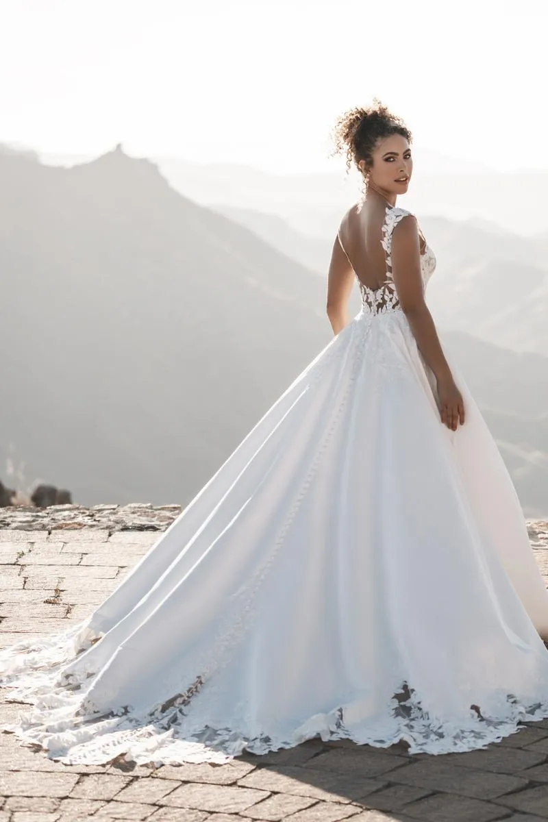 Certainly! An optimized title for the e-commerce product Allure Bridals Dress A1213 with modifiers could be:

Elegant Lace Wedding Gown A1213 by Allure Bridals - Sleeveless, Floor-Length, Ivory

This title includes descriptive and enticing modifiers that help convey key details and appeal to potential buyers.